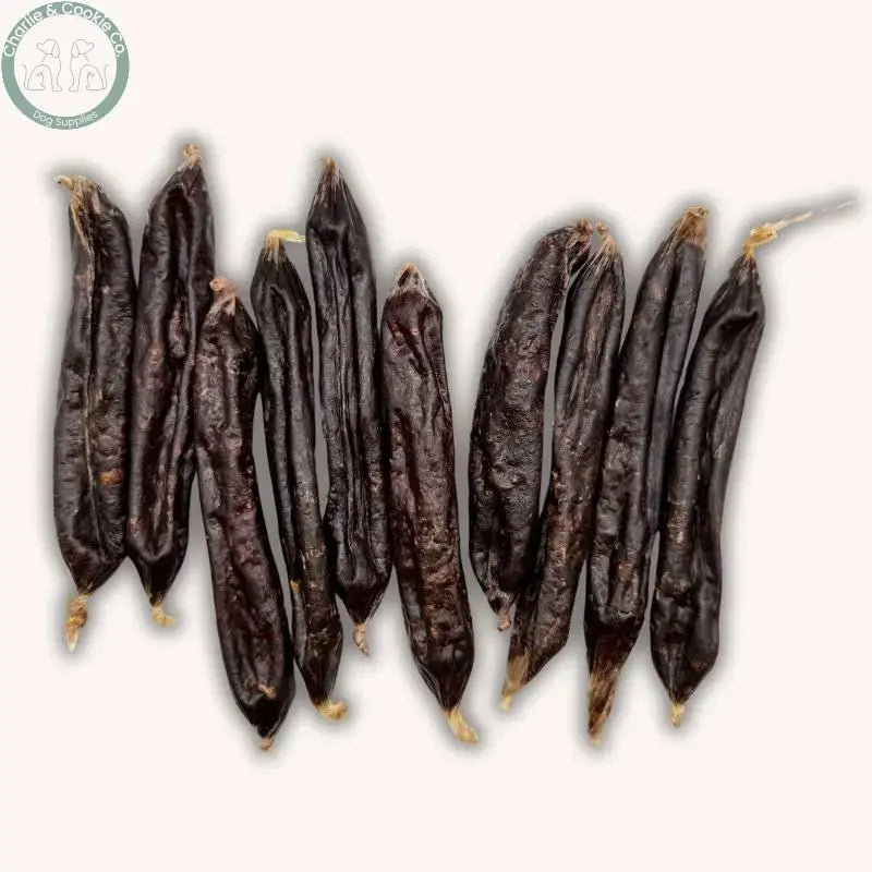 C&amp;C Gourmet Sausages Venison and Beef dog treats shown with other natural dog treats