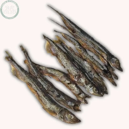Pile of whole dried Fish D’Light capelin
