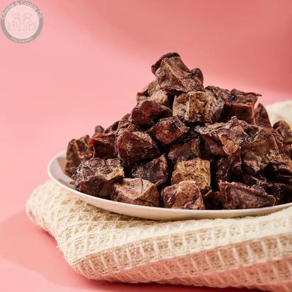 Waita Air-Dried Lamb Puffs 70g, lamb puffs on a pink setting